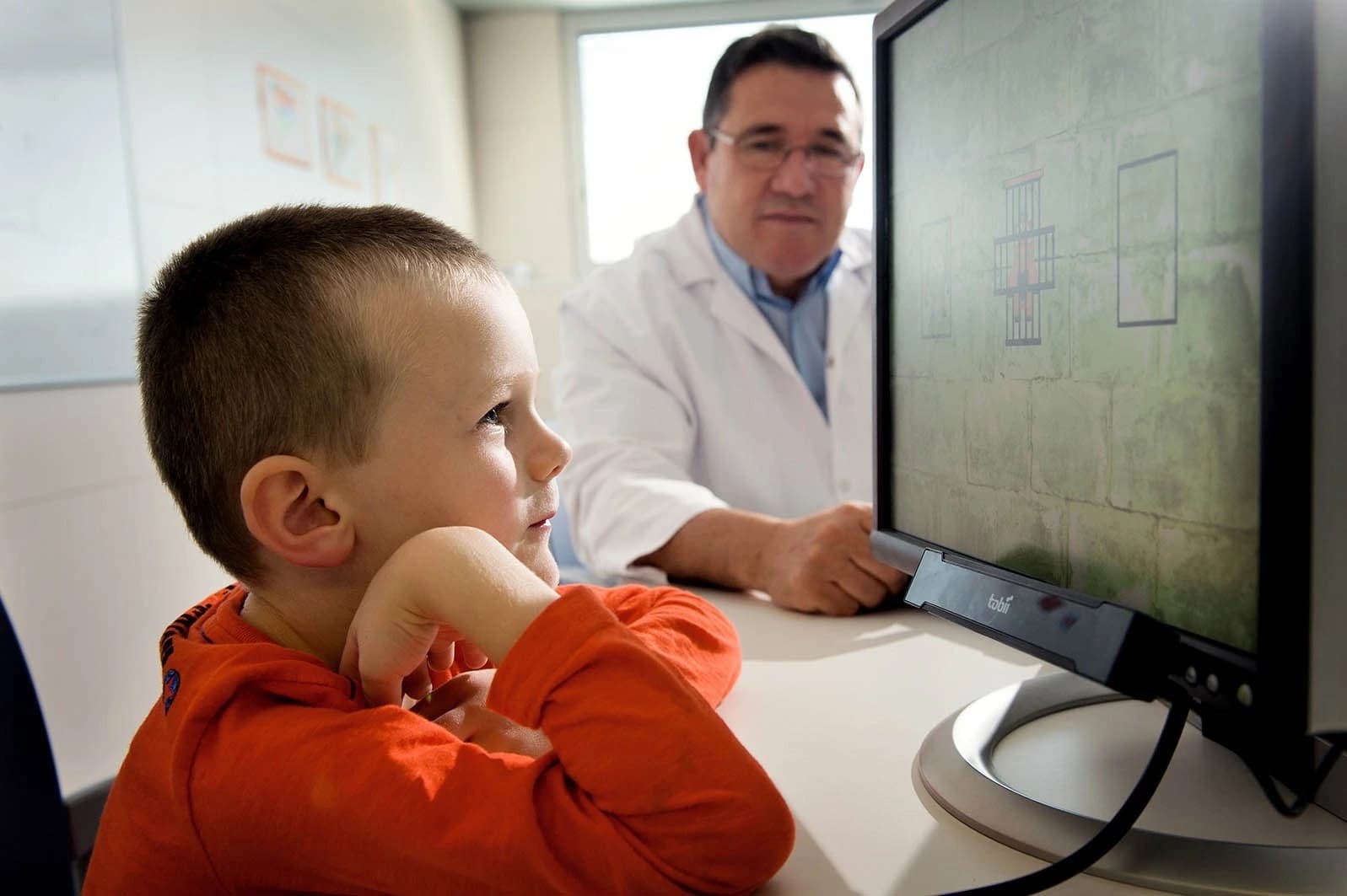 Medical professional using eye-tracking diagnostic device